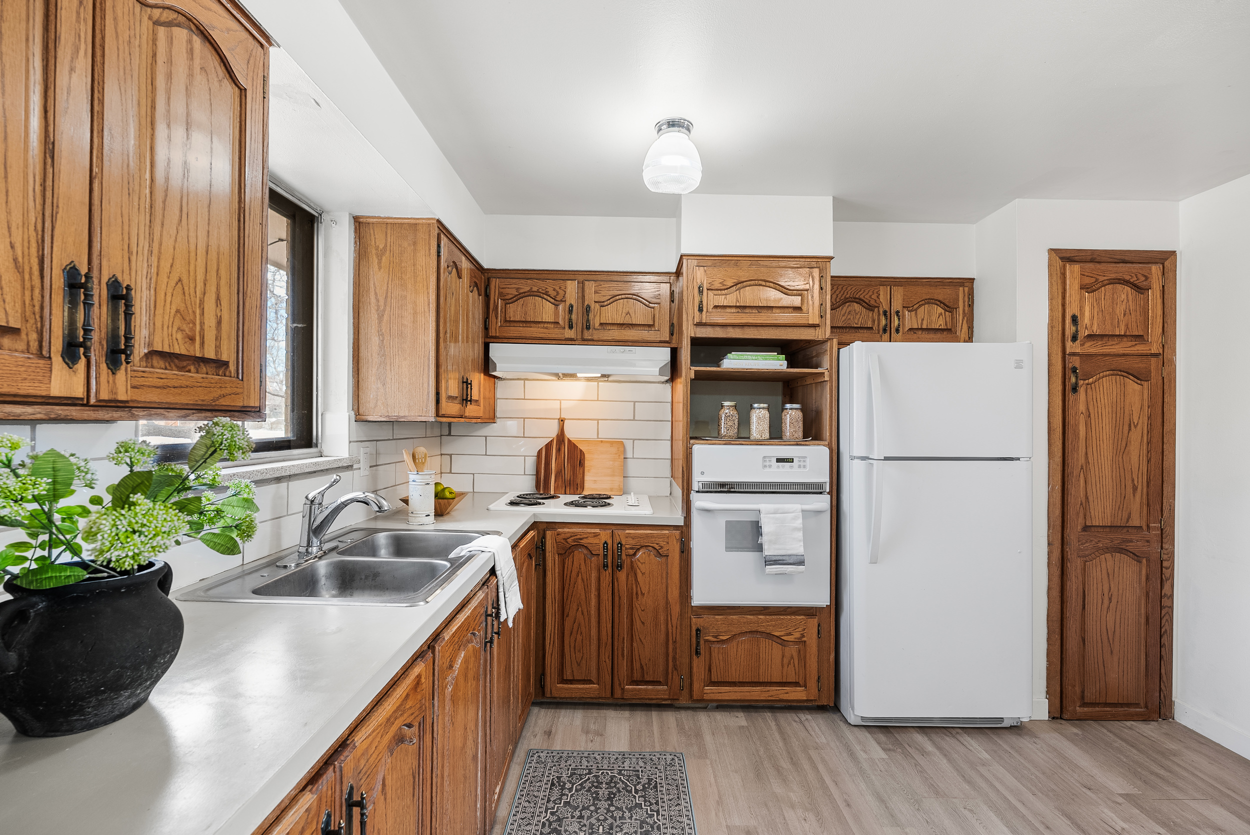Interior at 4585 Garland Street, Wheat Ridge CO after paint, staging and the new backsplash
